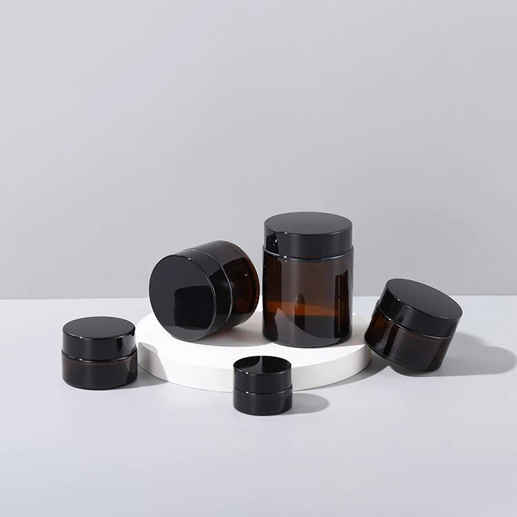50g amber glass jar with black lid